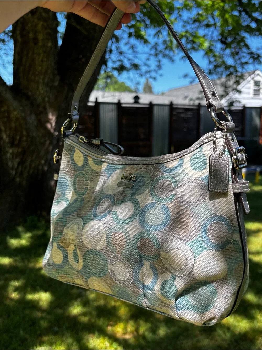 Coach baguette shoulder bag featuring a multicolored 